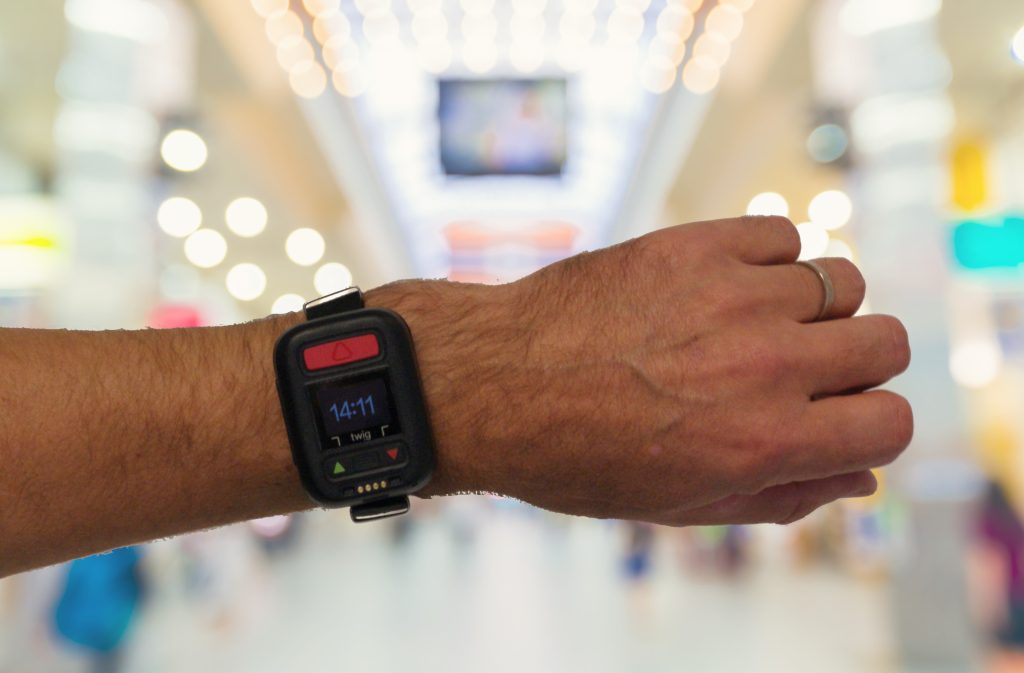 TWIG Neo wrist with shopping mall background scaled