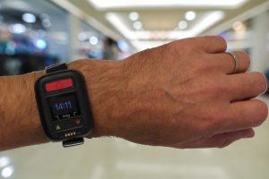TWIG Neo wrist with shopping mall background 2 scaled